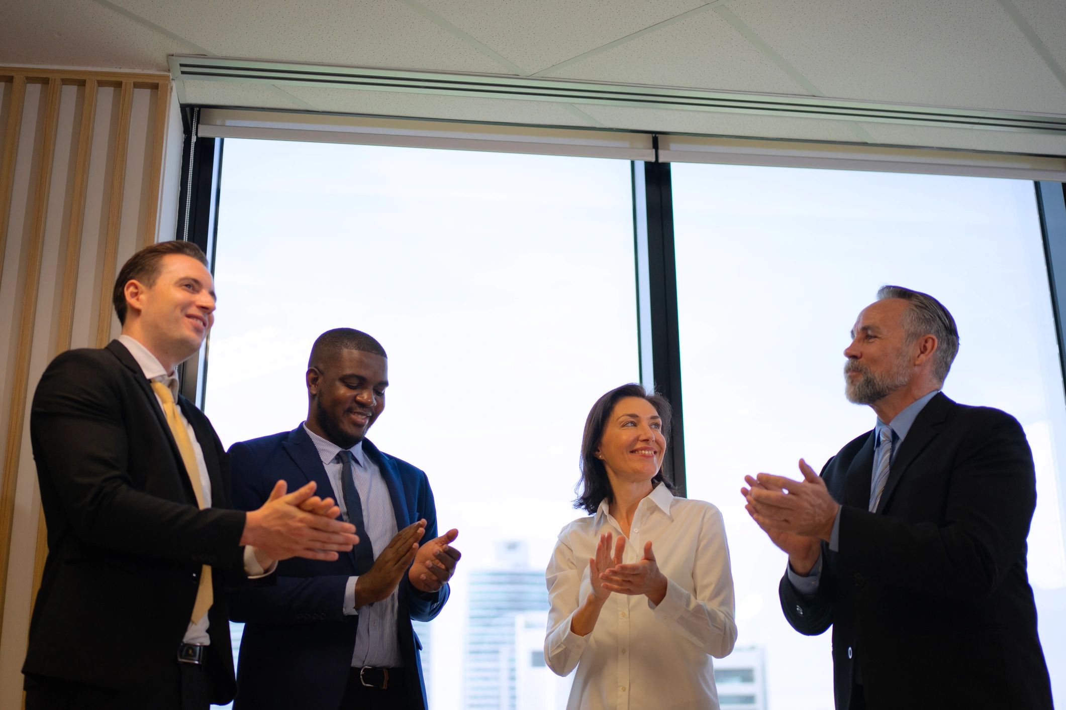 Officials in discussion during a development planning meeting