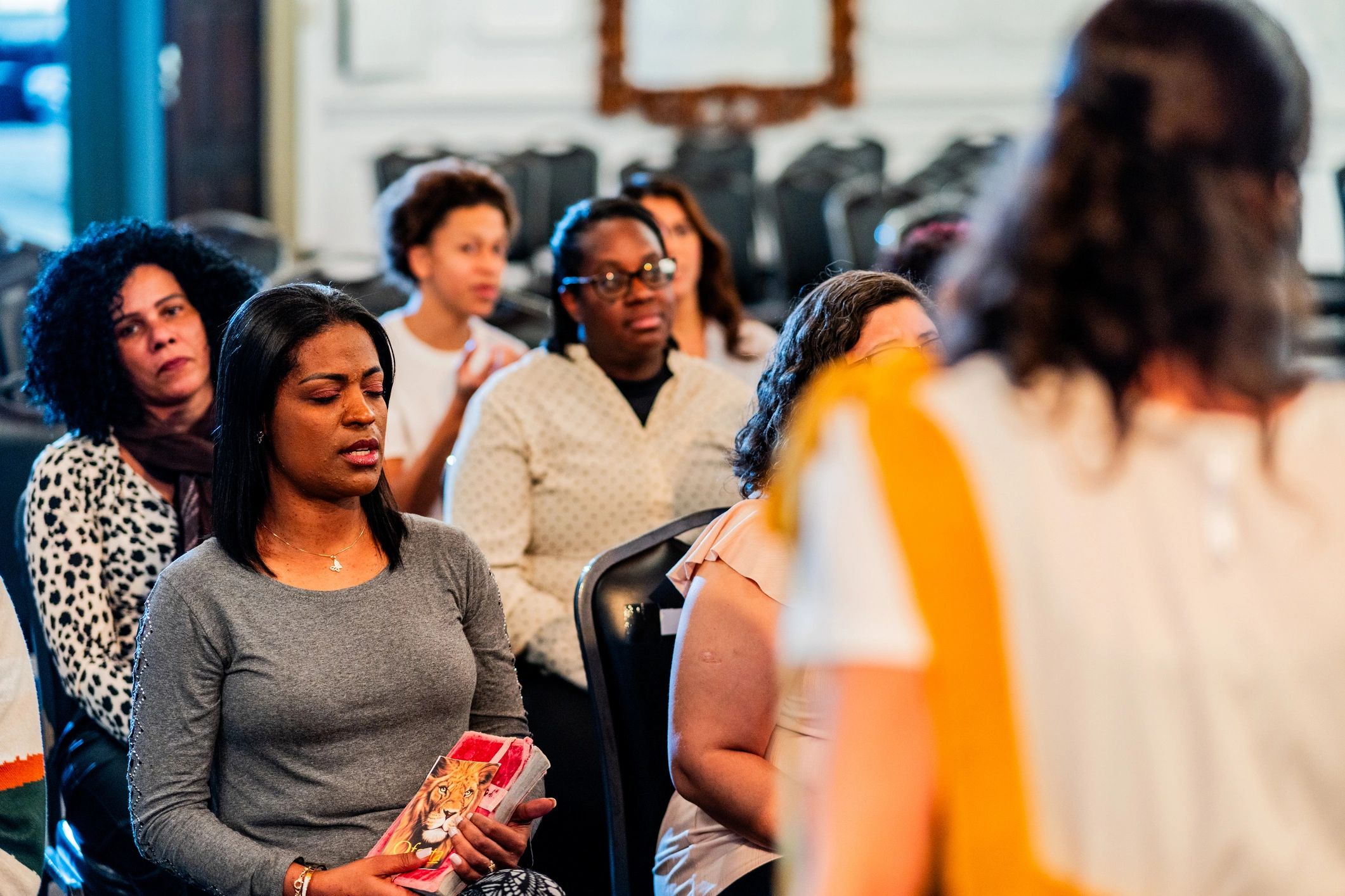 Community members attending a service gathering